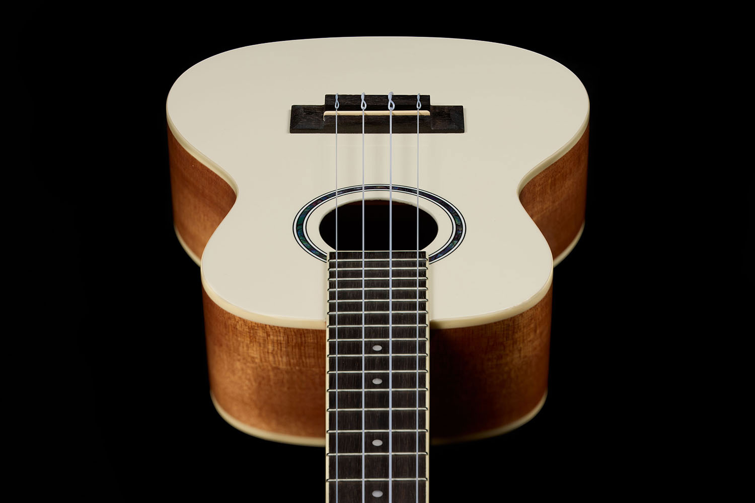 Top down view looking down the neck of the Córdoba 15C Mallorcan Pearl ukulele