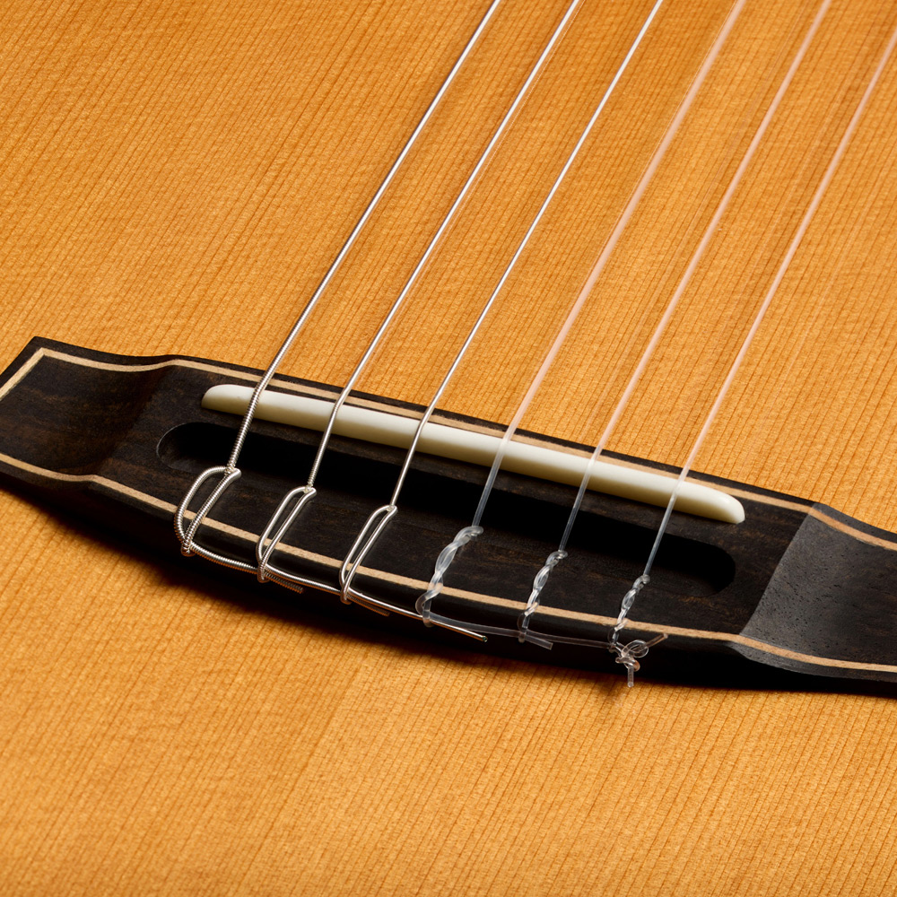 Close-up view of Stage Artist Traditional bridge thumb