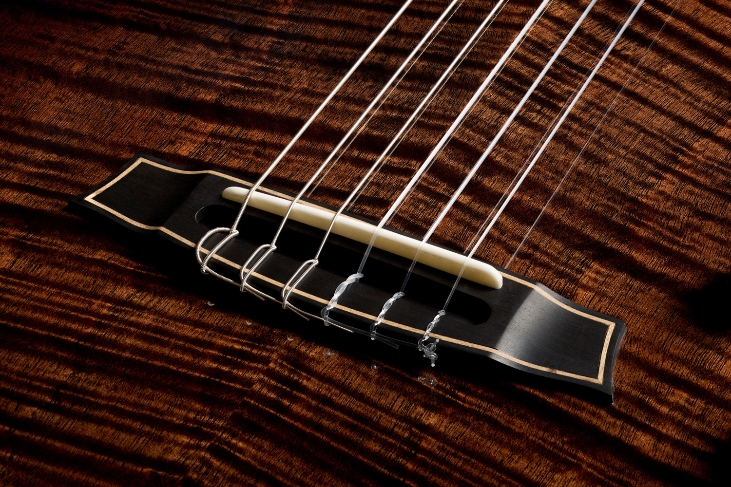 Close-up view of Stage Artist Habano Burst bridge