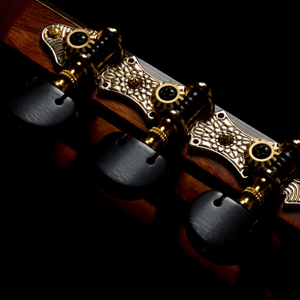 Close-up view of Córdoba Flower Petal tuners on the Stage Artist Habano Burst thumb