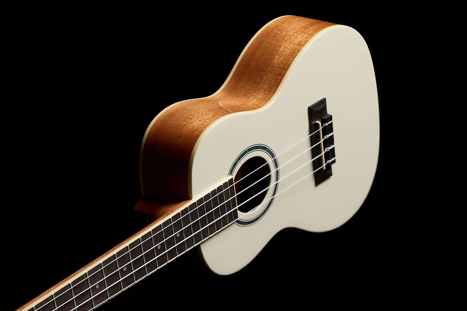 Angled side view of Córdoba 15C Mallorcan Pearl ukulele