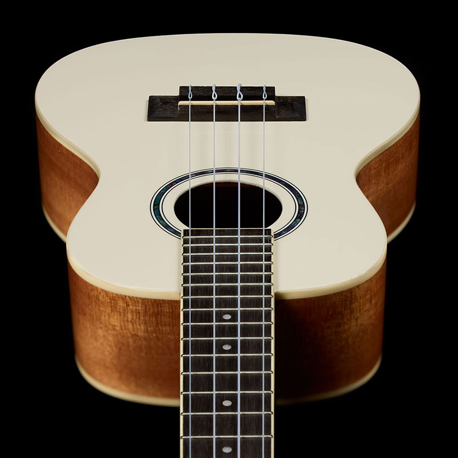 Top down view looking down the neck of the Córdoba 15C Mallorcan Pearl ukulele thumb