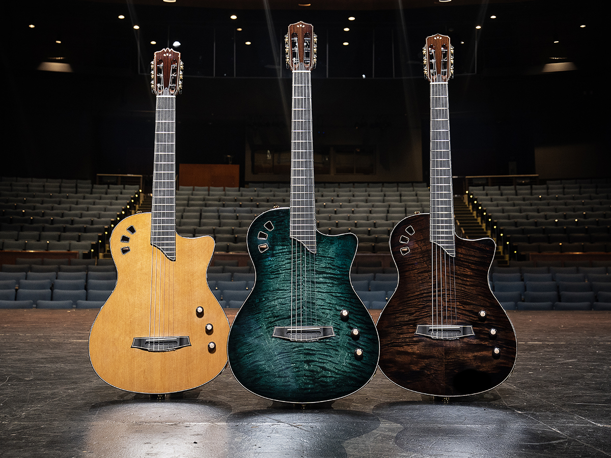 Stage Artist Traditional, Stage Artist Agave Burst, Stage Artist Habano Burst next to each other on a stage with seats behind