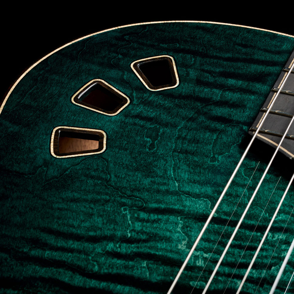 Close-up of Stage Artist Agave Burst soundhole thumb