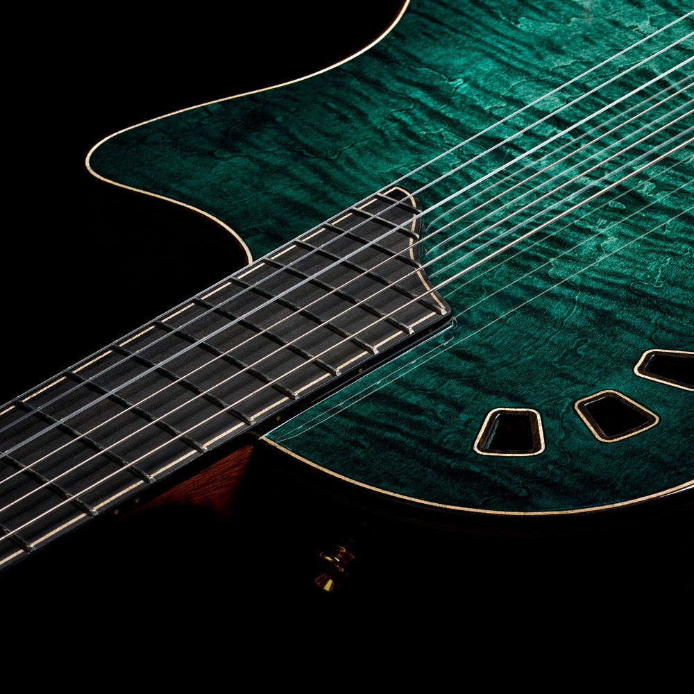 Top down view of Stage Artist Agave Burst neck and strings thumb