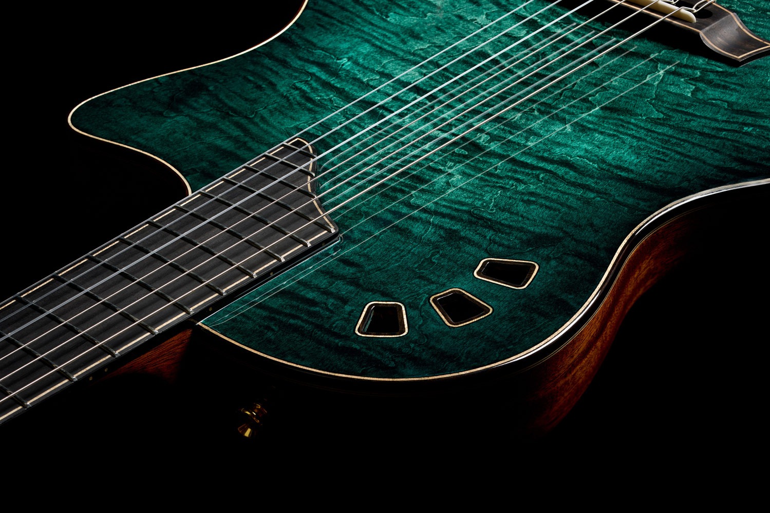 Top down view of Stage Artist Agave Burst neck and strings