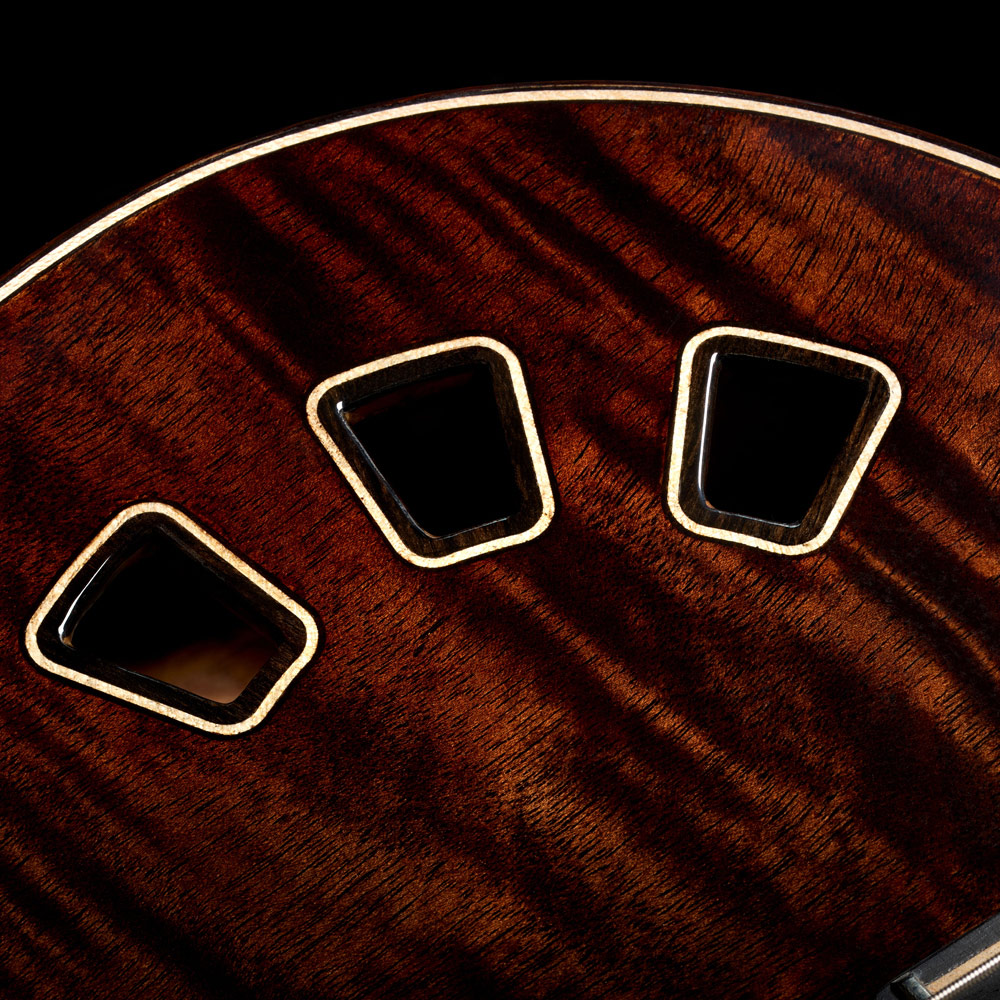 Close-up view of Stage Artist Habano Burst soundhole thumb