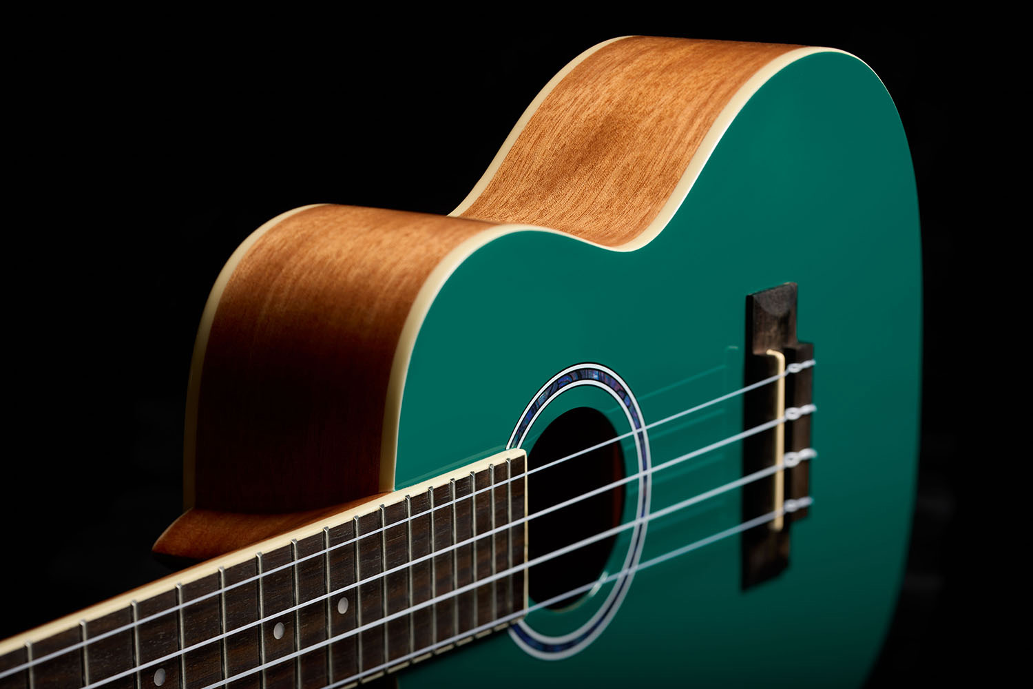 View of front body and side of Córdoba 15C Catalonia Green ukulele